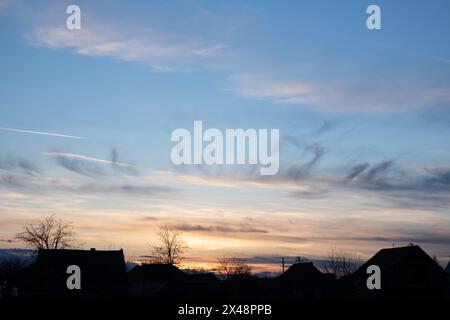 Real amazing panoramic sunset sky with gentle colorful clouds. Stock Photo