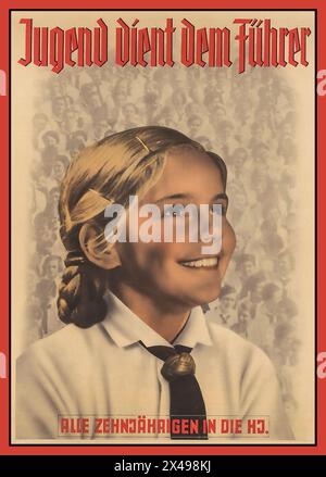 WW2 Nazi Propaganda 'Jugend Dient Dem Fuhrer'  'Youth Serves The Leader.' Hitler youth girl in uniform in front of a background image of crowds of Hitler Jugend girls. Captioned at bottom All Ten Year olds join the Hitler Jugend. Propaganda Recruitment Poster 1940 Nazi Germany Stock Photo