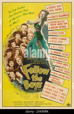 WW2 'Follow the Boys'  is a 1944 musical film movie made by Universal Pictures during World War II as an all-star cast morale booster to entertain the troops abroad and the civilians at home. The film was directed by A. Edward 'Eddie' Sutherland and produced by Charles K. Feldman. Starring George Raft, Orson Welles, Marlene Dietrich, Dinah Shore, W C Fields, The Andrews Sisters etc etc Hollywood USA Stock Photo