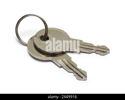 Two Small Keys Cut Out on White. Stock Photo