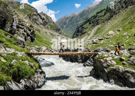 Trekking through the beautiful lush Warwan Valley, Pir Panjal Range, Kashmir, India Stock Photo