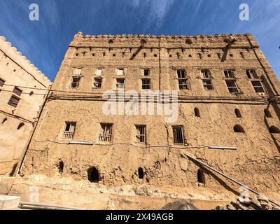 Falling down mud-brick ruins of the old village in Al Hamra, Oman Stock Photo