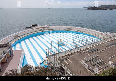 Freshly painted stripes a part of a larger refurbishment project at Plymouth’s iconic art deco Tinside Lido on the shore of Plymouth Sound. Stock Photo