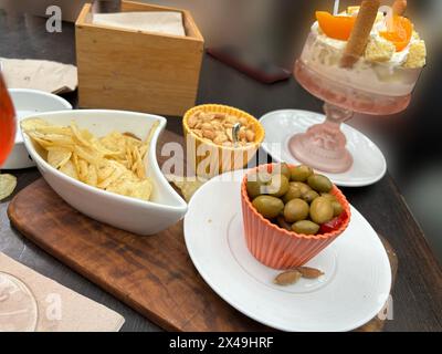 finger food and appetizers on a table together with an ice cream Stock Photo