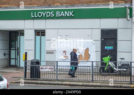 LONDON- APRIL 4th, 2024: Closed down Lloyds Bank in Willesden Green.  Part of large trend of many high street banks closing across the UK Stock Photo