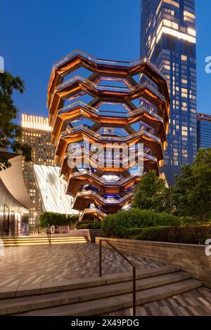 The Vessel, also known as the Hudson Yards Staircase (designed by architect Thomas Heatherwick) at dusk. Chelsea, Manhattan, New York City Stock Photo