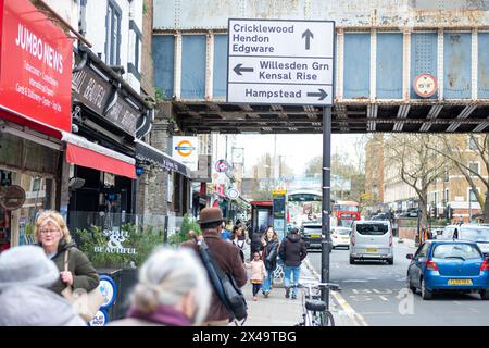 LONDON- APRIL 4th, 2024:  Kilburn High Road in NW6 North West London. A long and busy a high street of shops Stock Photo