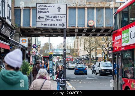 LONDON- APRIL 4th, 2024:  Kilburn High Road in NW6 North West London. A long and busy a high street of shops Stock Photo