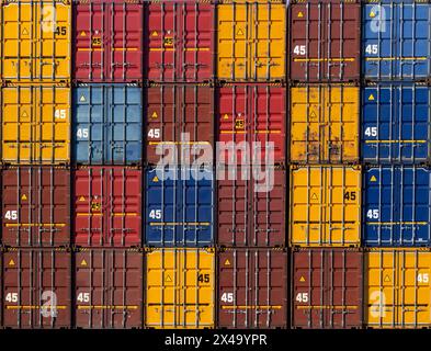 Colorful Shipping Containers Stacked in Port Stock Photo