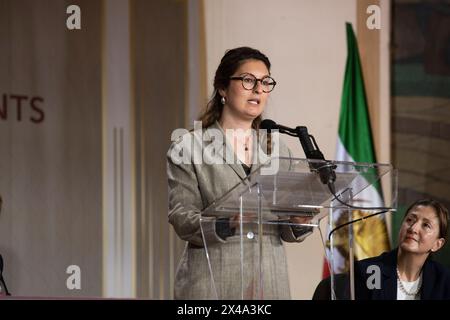 Paris, France. 30th Apr, 2024. Sara Nouri, lawyer at the Paris Bar, speaking during the conference in “Solidarity with the Iranian Resistance.” On the eve of May 1st, the Exhibition and conference in “Solidarity with Iranian resistance” at Paris 5th Town Hall, opposite the Pantheon. During the event, the recent death sentences of political prisoners and the stepped-up repression of women in Iran were denounced. (Photo by Siavosh Hosseini/SOPA Images/Sipa USA) Credit: Sipa USA/Alamy Live News Stock Photo