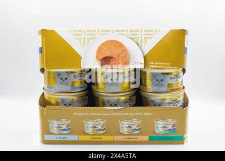 Kyiv, Ukraine - May 23, 2023: Purina Gourmet Gold luxury pet food cans on white background. Formed in 2001 Purina Petcare is a subsidiary of Nestle. I Stock Photo