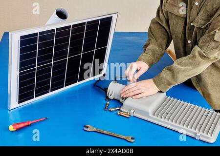 Stand alone LED street light with solar module, DIY assembly at home. Stock Photo