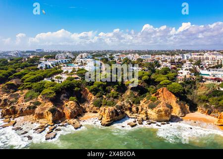 Amazing view from the sky of town Olhos de Agua in Albufeira, Algarve, Portugal. Aerial coastal view of town Olhos de Agua, Albufeira area, Algarve, P Stock Photo