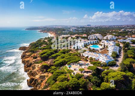 Amazing view from the sky of town Olhos de Agua in Albufeira, Algarve, Portugal. Aerial coastal view of town Olhos de Agua, Albufeira area, Algarve, P Stock Photo