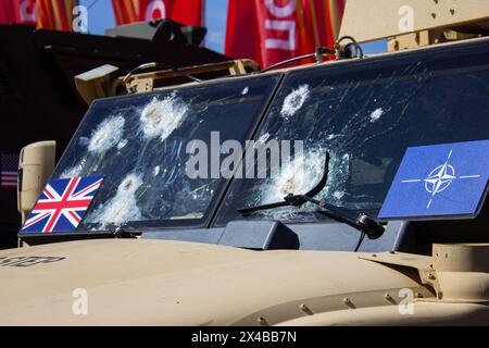 Bullet holes are seen on the windshield of a Husky TSV, a variant of the MXT-MVA infantry mobility vehicle supplied to Ukraine by the UK. An exhibition of trophy military equipment captured by Russian servicemen during the Russian-Ukraine war, known as the special military operation in Russia, opened in the Victory Park in Moscow on May 1, 2024. Damaged, destroyed, and captured military equipment of NATO countries and Ukraine are exhibited to the Russian public. The Russian-Ukraine war began on February 24, 2024. Since then the NATO countries have been supplying the Ukraine army with weapons. Stock Photo