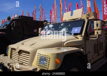 Bullet holes are seen on the windshield of a Husky TSV, a variant of the MXT-MVA infantry mobility vehicle supplied to Ukraine by the UK. An exhibition of trophy military equipment captured by Russian servicemen during the Russian-Ukraine war, known as the special military operation in Russia, opened in the Victory Park in Moscow on May 1, 2024. Damaged, destroyed, and captured military equipment of NATO countries and Ukraine are exhibited to the Russian public. The Russian-Ukraine war began on February 24, 2024. Since then the NATO countries have been supplying the Ukraine army with weapons. Stock Photo