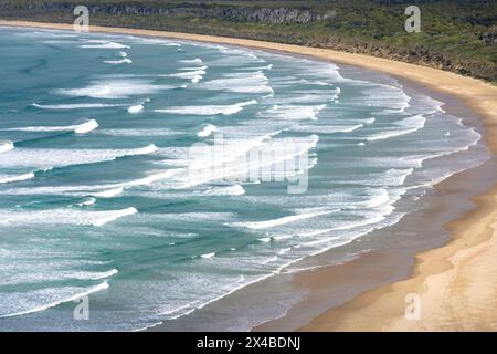 Wave patterns on Tautuku Beach and Bay from Florence Hill Lookout, Chaslands Highway, The Catlins Coast, Otago, New Zealand Stock Photo