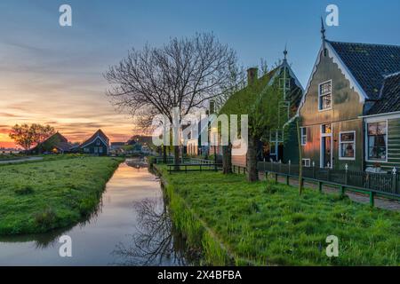 Dutch traditional house sunrise at Zaanse Schans Village, Netherlands Stock Photo