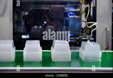 Clear plastic Boxs transfer on Automated conveyor systems industrial automation for package Stock Photo