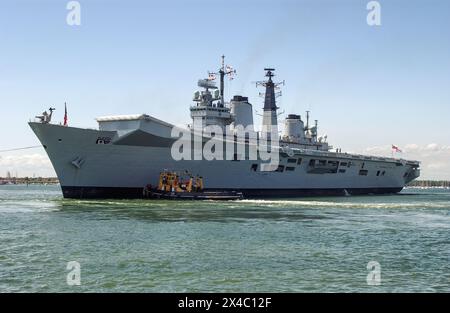 HMS Invincible (R05) Royal Navy Aircraft carrier approaching Portsmouth ...