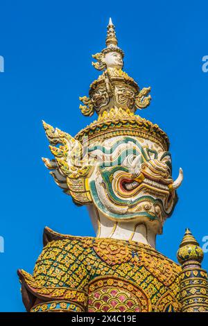 White guardians statue, Grand Palace, Bangkok, Thailand. Palace was home of King of Thailand from 1782 to 1925 Stock Photo