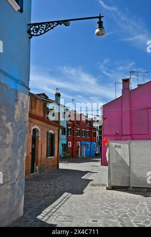 Burano, Italy - April 17, 2024: View of the colorful houses on the island in the Venice Lagoon Stock Photo