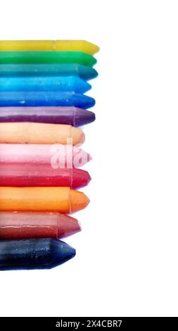 Multicolour crayon isolated in white background. Crayons. Colourful wax pencils collection. Seven colours of crayon. Used crayon pencils. Pile of crayon isolated in white background. Stock Photo