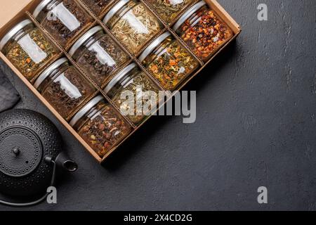 Tea time assortment: Various dry tea leaves. Flat lay with copy space Stock Photo