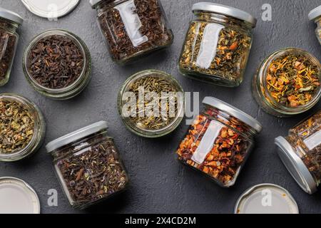 Tea time assortment: Various dry tea leaves. Flat lay Stock Photo