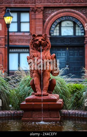 Savannah, Georgia, USA. Griffin Lion water fountain at the Savannah Cotton Exchange building Stock Photo