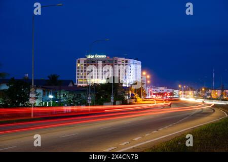 Kota Kinabalu, Sabah. Malaysia. 28 January 2023. Night shot with light trail at the Putatan city. The One Borneo hotel taken at night. Stock Photo