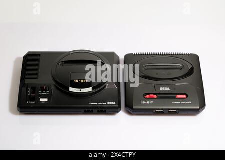 Newcastle UK: 21st Jan 2024: A closeup of a Sega Mega Drive MOdels I and II mini consoles. Retro gaming. Megadrive Stock Photo