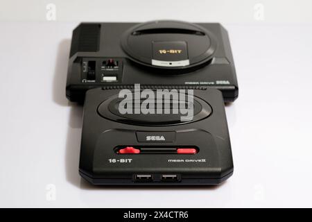 Newcastle UK: 21st Jan 2024: A closeup of a Sega Mega Drive MOdels I and II mini consoles. Retro gaming. Megadrive Stock Photo