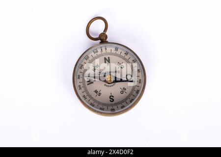 Vintage Compass on White Background - Navigation Concept for Retro Travel Exploration Stock Photo