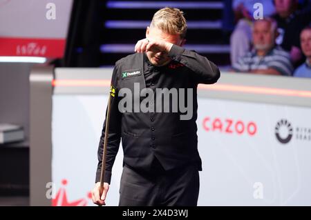 Kyren Wilson reacts after missing out on a maximum break against David Gilbert (not pictured) during the semi-final match on day thirteen of the 2024 Cazoo World Snooker Championship at the Crucible Theatre, Sheffield. Picture date: Thursday May 2, 2024. Stock Photo