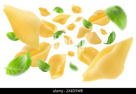 Italian pasta with basil leaf levitating isolated on white background. Uncooked Italian Pasta. Clipping path, full depth of field. Concept of flying f Stock Photo