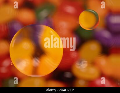 Colorful abstract macro background with oil drops in water Stock Photo