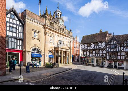 The Buttercross Museum and half-timbered buildings in the centre of the medieval market town of Ludlow, Shropshire, England UK Stock Photo