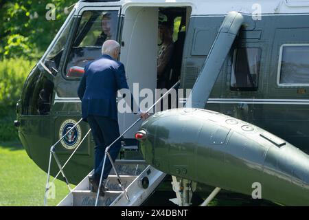 Washington, United States Of America. 01st Apr, 2024. United States President Joe Biden boards Marine One as he departs the White House in Washington, DC, headed to North Carolina, to pay his respects to the law enforcement officers killed and wounded recently in the line of duty in Charlotte and then make remarks on infrastructure in Wilmington, May 2, 2024. Credit: Chris Kleponis/Pool/Sipa USA Credit: Sipa USA/Alamy Live News Stock Photo