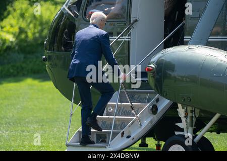 Washington, United States Of America. 01st Apr, 2024. United States President Joe Biden boards Marine One as he departs the White House in Washington, DC, headed to North Carolina, to pay his respects to the law enforcement officers killed and wounded recently in the line of duty in Charlotte and then make remarks on infrastructure in Wilmington, May 2, 2024. Credit: Chris Kleponis/Pool/Sipa USA Credit: Sipa USA/Alamy Live News Stock Photo