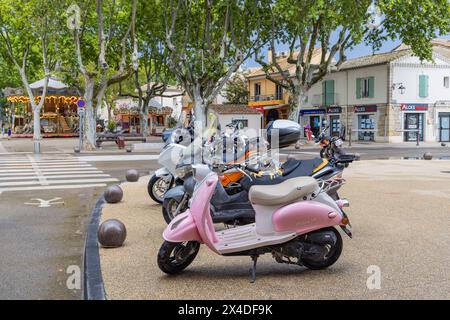Aigues-Mortes, Gard, Occitania, France. Scooters parked in the center of Aigues-Mortes. (Editorial Use Only) Stock Photo
