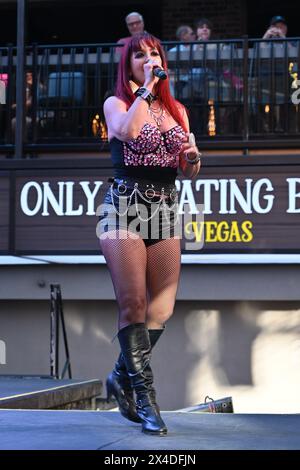 Female lead singer on Fremont street in Las Vegas. Stock Photo