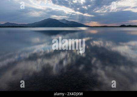 Ireland, Lough Leane. Sunset reflections on lake. Stock Photo