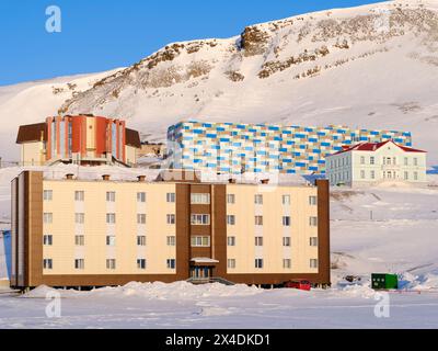 Russian coal mining town Barentsburg at fjord Gronfjorden. The coal mine is still in operation. Arctic Region, Scandinavia, Norway, Svalbard Stock Photo
