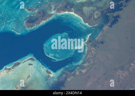 Zapata Peninsula, Cuba. 15 April, 2024. A view from the International Space Station of the Zapata Peninsula on the southern coast of Cuba from nearly 260 miles above, April 15, 2024, in Earth Orbit. Both a Biosphere Reserve and National Park, it's home to diverse ecosystems, including coral reefs in the cove of the Caribbean Sea. Credit: Astronaut Provided/NASA Photo/Alamy Live News Stock Photo