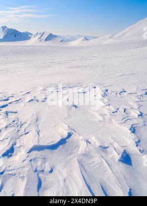 landscape with Sastrugi at pass from Vestre Gronfjorden to Fridtjovbreen, Island of Spitsbergen. Arctic region, Scandinavia, Norway, Svalbard Stock Photo