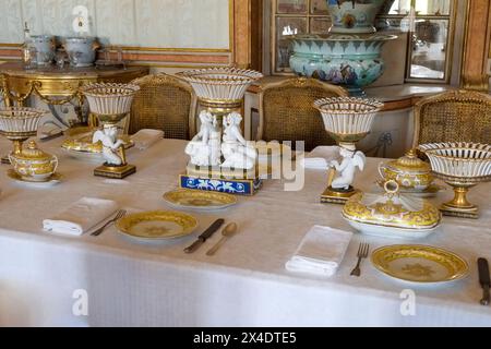 Lisbon, Portugal. Royal Palace table setting with royal dinnerware. Stock Photo