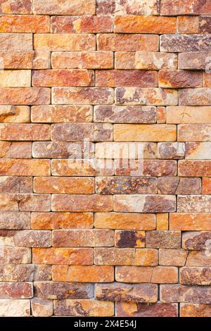 masonry of yellow brick tile. decorative architecture pattern for outdoor renovation Stock Photo