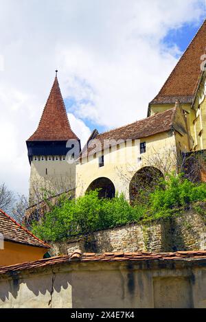 Architecture of a church with a fortress in the Romanian village of Biertan Stock Photo