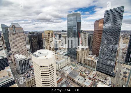 Calgary Alberta Canada, April 05 2024: Aerial cityscape overlooking tall buildings and landmarks with downtown streets. Stock Photo